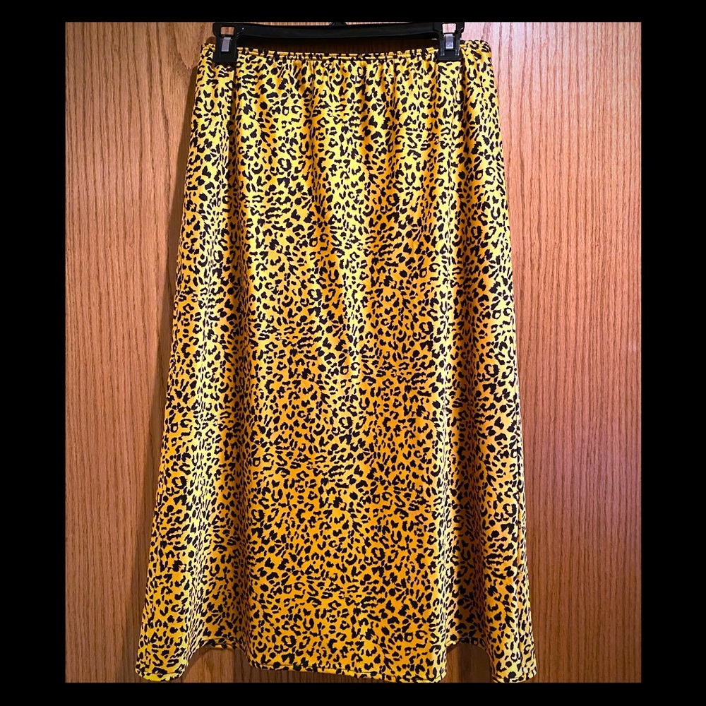 Unique animal print midi skirt. NWOT